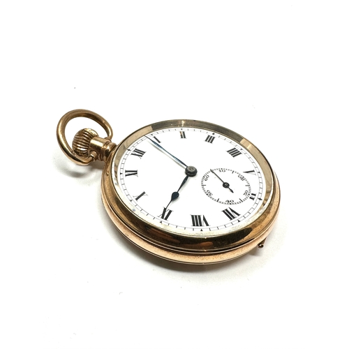 390 - Antique  gold plated open face  pocket watch the watch is ticking