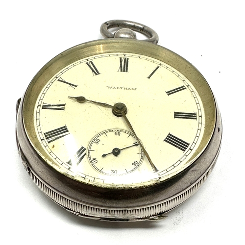 394 - Antique silver open face waltham  pocket watch the watch is ticking