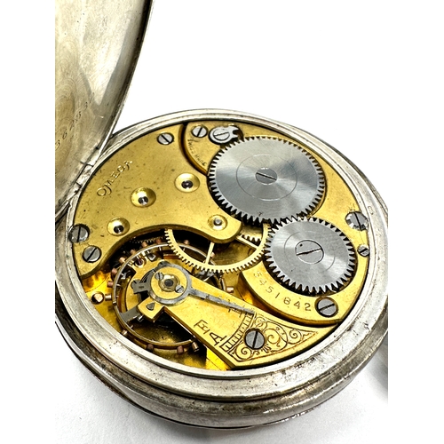 396 - Antique silver open face Omega pocket watch the watch balance spins the watch keep winding