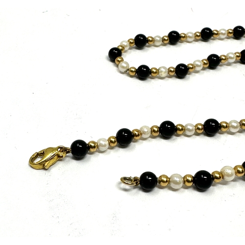 71 - 9ct gold Cultured  Pearl & black bead with gold spacers necklace measures approx 41cm long