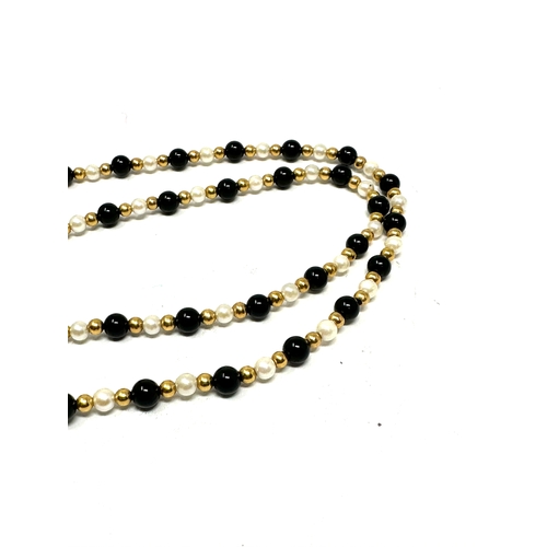 71 - 9ct gold Cultured  Pearl & black bead with gold spacers necklace measures approx 41cm long