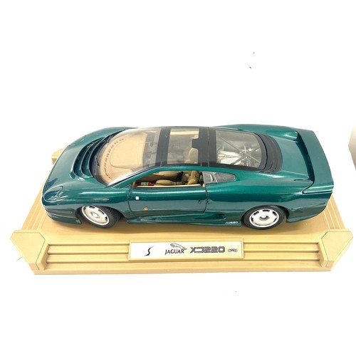 99 - Maisto 1992 Jaguar XJ220 model on stand measures approx