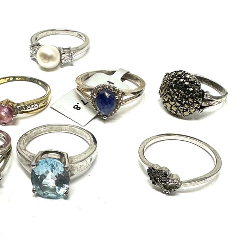 296 - Eight silver stone set rings i(24g)