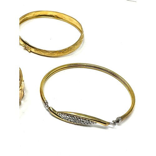 294 - Four silver bracelets including 9ct gold bonded (33g)