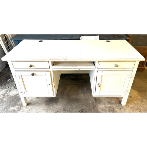 403 - 4 Drawer painted desk measures approximately 30 inches 60 inches wide by 24 inches