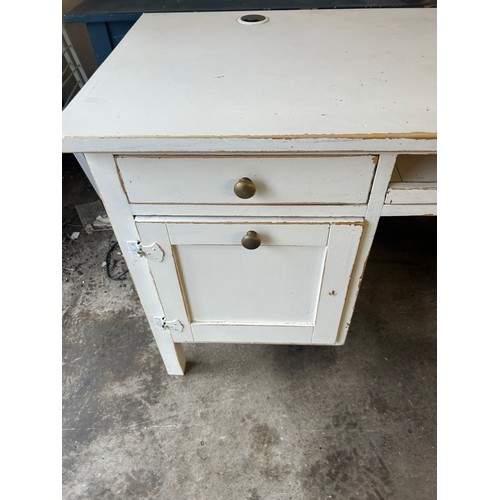 403 - 4 Drawer painted desk measures approximately 30 inches 60 inches wide by 24 inches