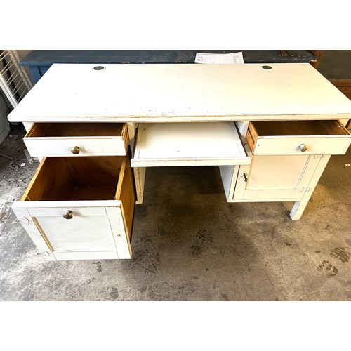 403 - 4 Drawer painted desk measures approximately 30 inches 60 inches wide by 24 inches