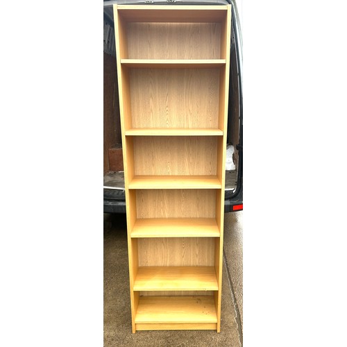 381 - 6 shelf oak. Bookcase measures approximately 80 inches tall 24 inches wide 11 inches depth