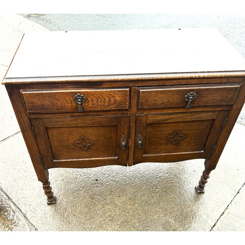 373 - 2 drawer 2 door small sideboard measures approximately 31 inches tall 36 inches wide 17 inches depth