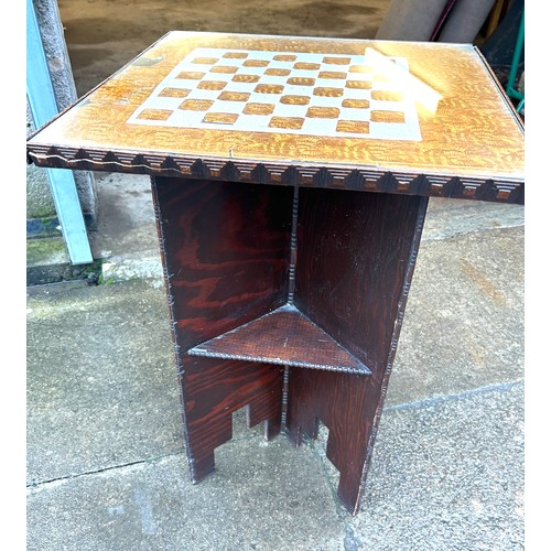 386 - Small vintage carved games table measures approximately 29 inches tall 20 inches square