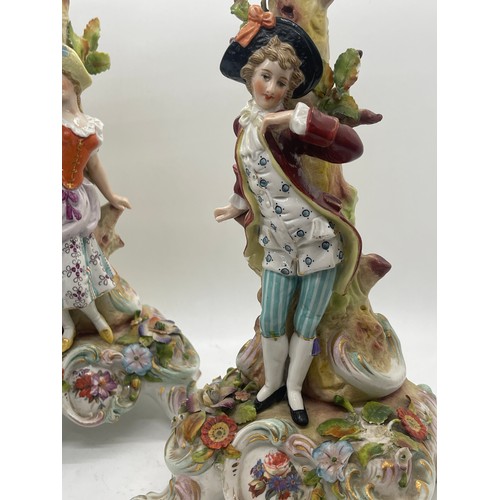 614 - Pair of Capodimonte candle sticks 11 inches tall, A/F