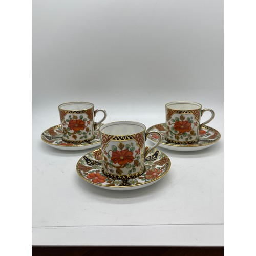 437 - Set of three Aynsley coffee cups and saucers