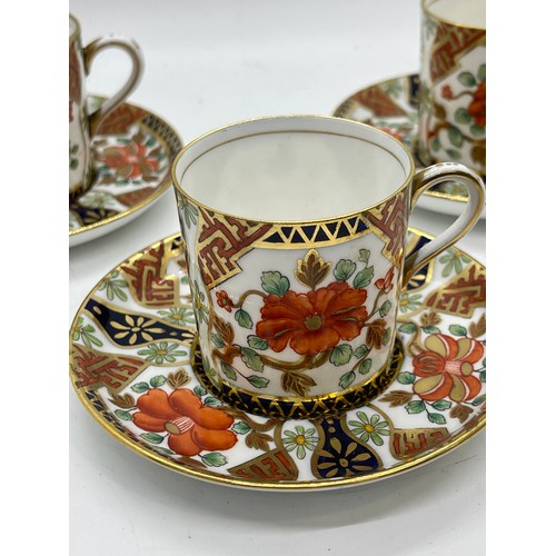 437 - Set of three Aynsley coffee cups and saucers