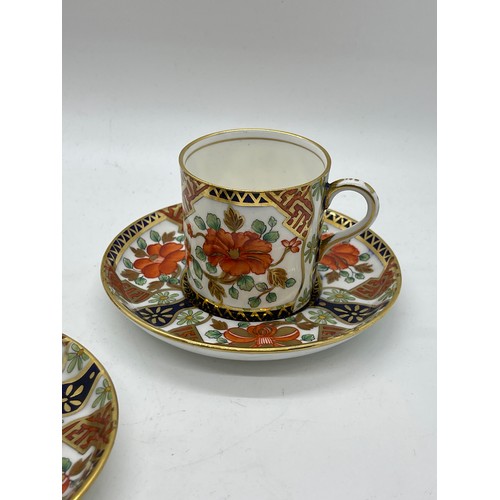 437 - Set of three Aynsley coffee cups and saucers