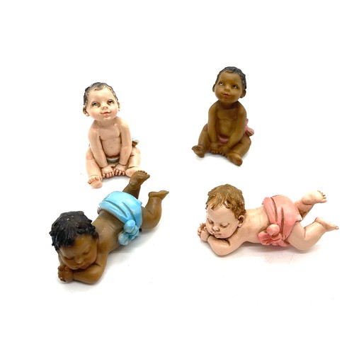 439 - Selection of baby figures signed