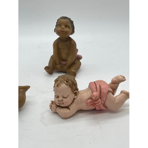 439 - Selection of baby figures signed