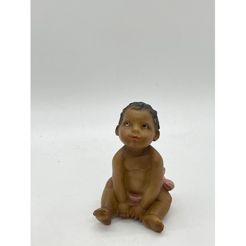 439 - Selection of baby figures signed