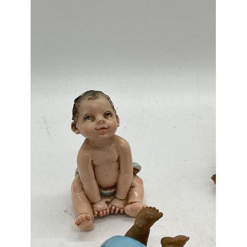 439 - Selection of baby figures signed