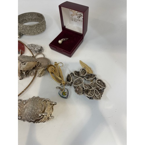 449 - Selection of costume jewellery to include necklaces and some silver bracelets