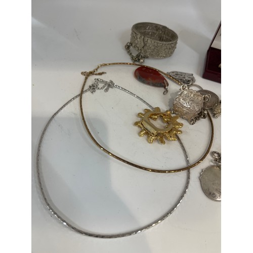 449 - Selection of costume jewellery to include necklaces and some silver bracelets