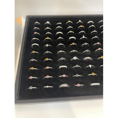 486 - Selection of silver rings approx 100 in total
Ring tray pictured not included