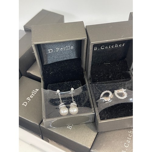 480 - Selection of silver B.Catcher boxed earrings