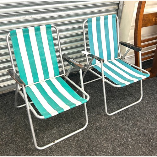 384 - Two vintage folding Mercury beach chairs