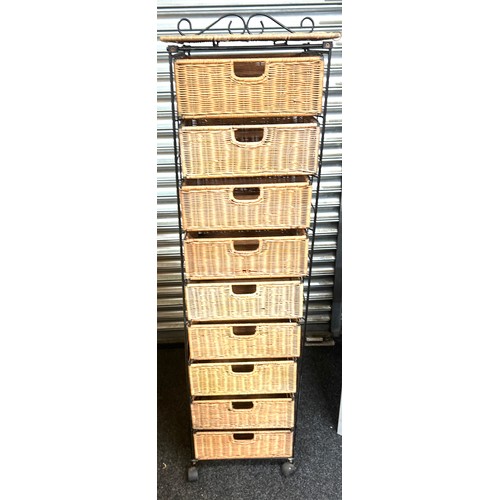 379 - 9 drawer metal and wicker storage drawers measures approx 59 inches tall by 16 inches wide and 14 de... 