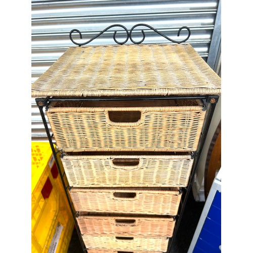 379 - 9 drawer metal and wicker storage drawers measures approx 59 inches tall by 16 inches wide and 14 de... 