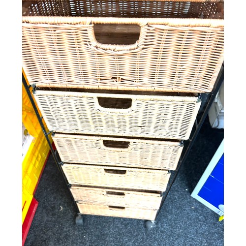 379 - 9 drawer metal and wicker storage drawers measures approx 59 inches tall by 16 inches wide and 14 de... 