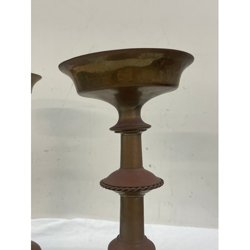 246 - Pair of church brass candlestick holders measures approx