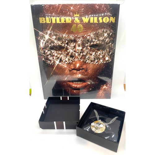 473 - Butler and Wilson costume jewellery necklace with reference book (sealed new condition)