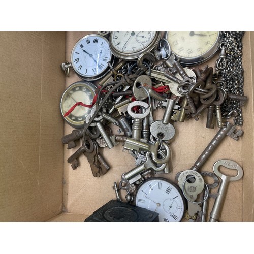 563 - Five vintage pocket watches , guard chain, victorian match striker, vintage keys etc