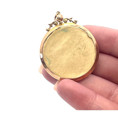 595 - 9ct gold victorian locket diameter 3.4 cm