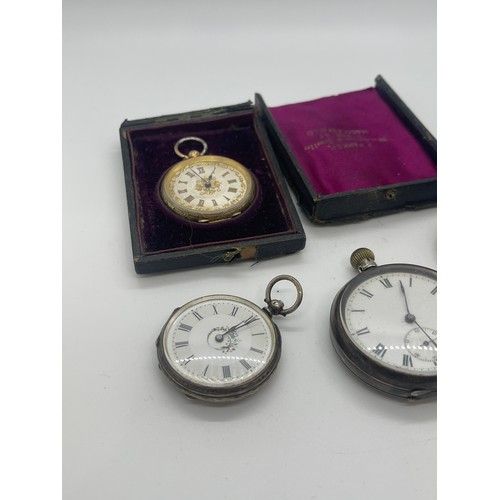 550 - Sterling silver double albert pocket watch chain and four silver pocket watches