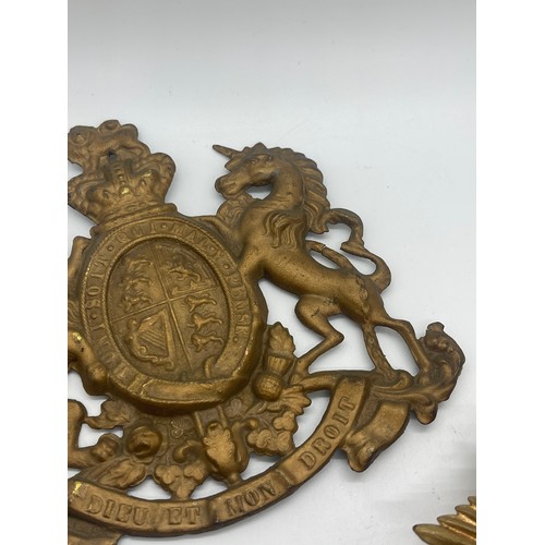 526 - Ministry of Defence police helmet plate together with victorian Royal Cipher plaque