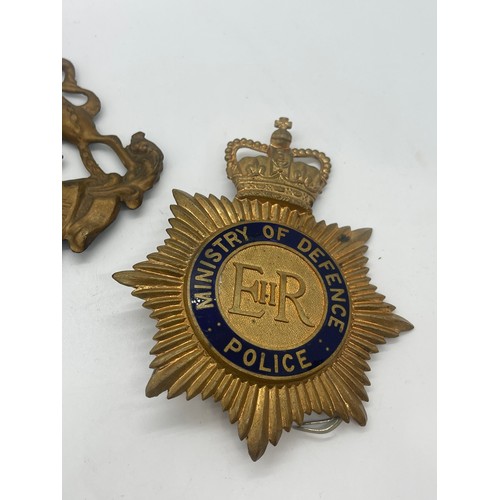 526 - Ministry of Defence police helmet plate together with victorian Royal Cipher plaque