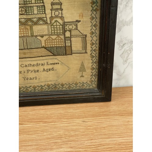 282 - Antique framed needlework sampler of St Pauls Cathedral by Charlotte Pyke, aged 8 years. 19th Centur... 