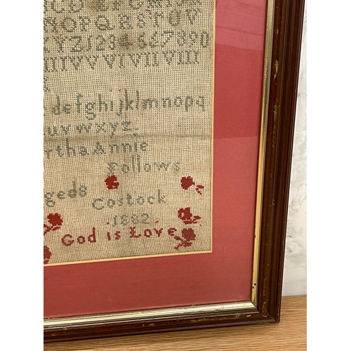 281 - Antique framed needlework sampler by Bertha Annie Follows, aged 8. Costock 1882. Size 35 x 46 cm ( f... 