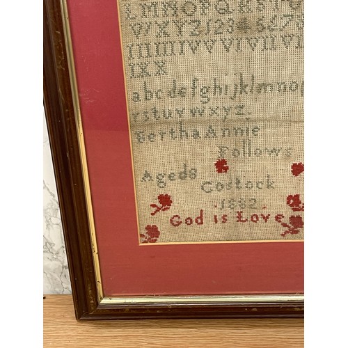 281 - Antique framed needlework sampler by Bertha Annie Follows, aged 8. Costock 1882. Size 35 x 46 cm ( f... 