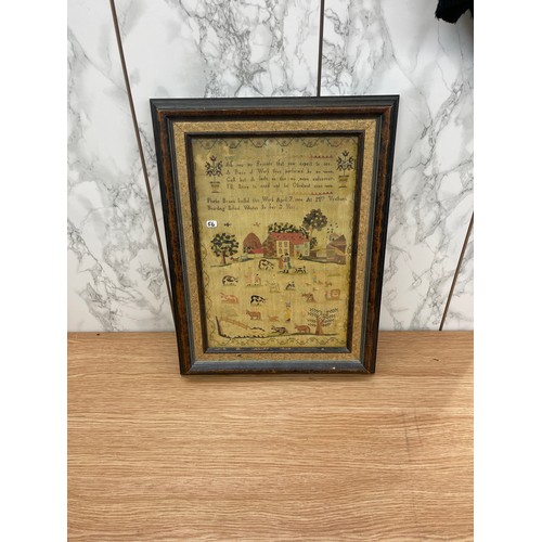 278 - Print of an antique needlework sampler frame size 28 x 37 cm.