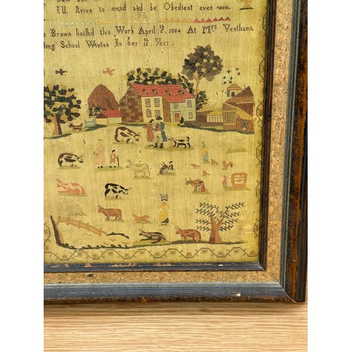 278 - Print of an antique needlework sampler frame size 28 x 37 cm.