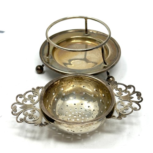 44 - .925 sterling tea strainer w/ dish