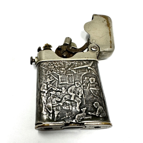 433 - Vintage Thorens silver lighter, a rare Swiss claw lighter marked 935 with repousse work to sides