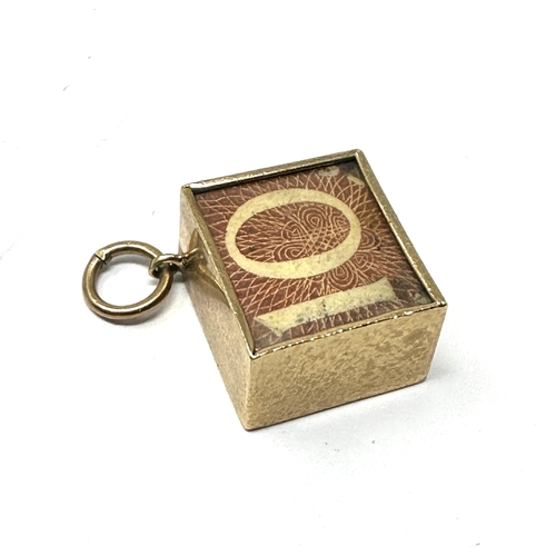 82 - 9ct gold 10 shilling emergency money charm weight 2.9g