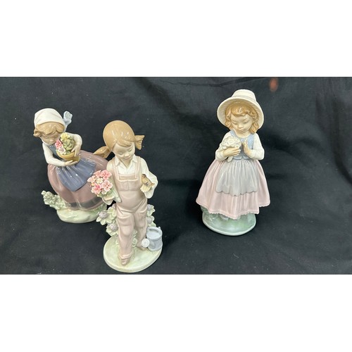 594 - Selection of 2 Lladro girl figures and 1 Nao figure includes Spring flowers etc