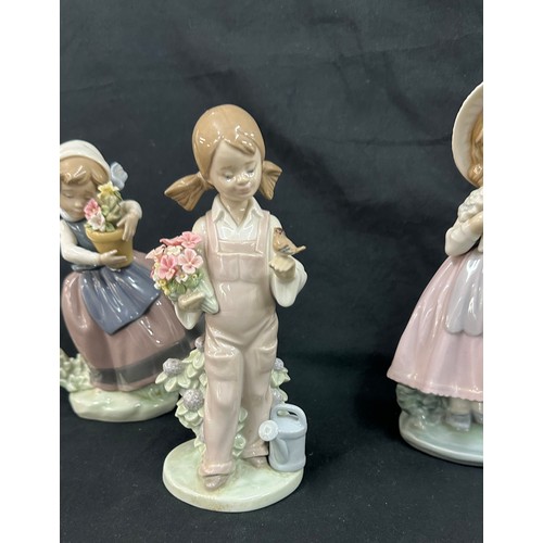 594 - Selection of 2 Lladro girl figures and 1 Nao figure includes Spring flowers etc