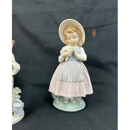 594 - Selection of 2 Lladro girl figures and 1 Nao figure includes Spring flowers etc