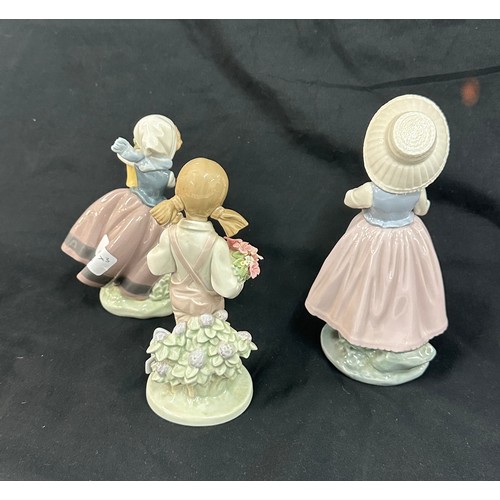 594 - Selection of 2 Lladro girl figures and 1 Nao figure includes Spring flowers etc