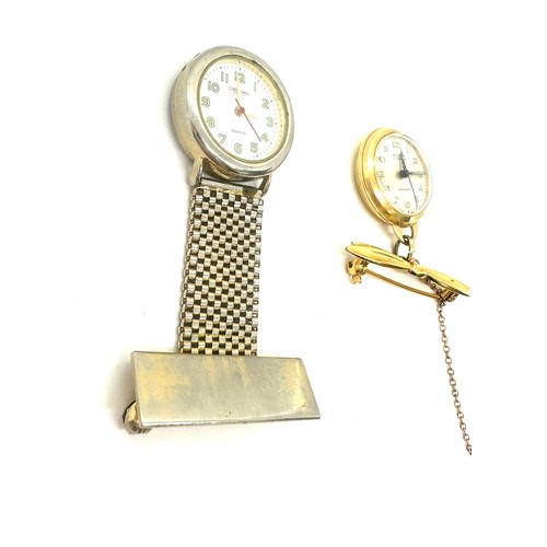 574 - Two ladies nurses watches includes Constant and Merlin, untested